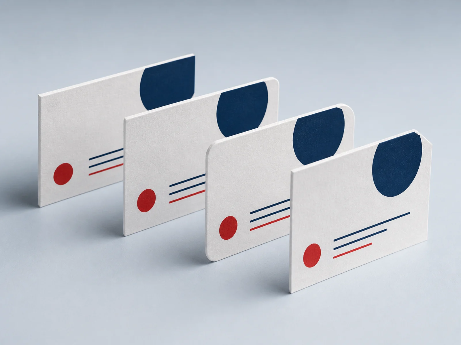 Business cards with rounded corners and square corners side by side