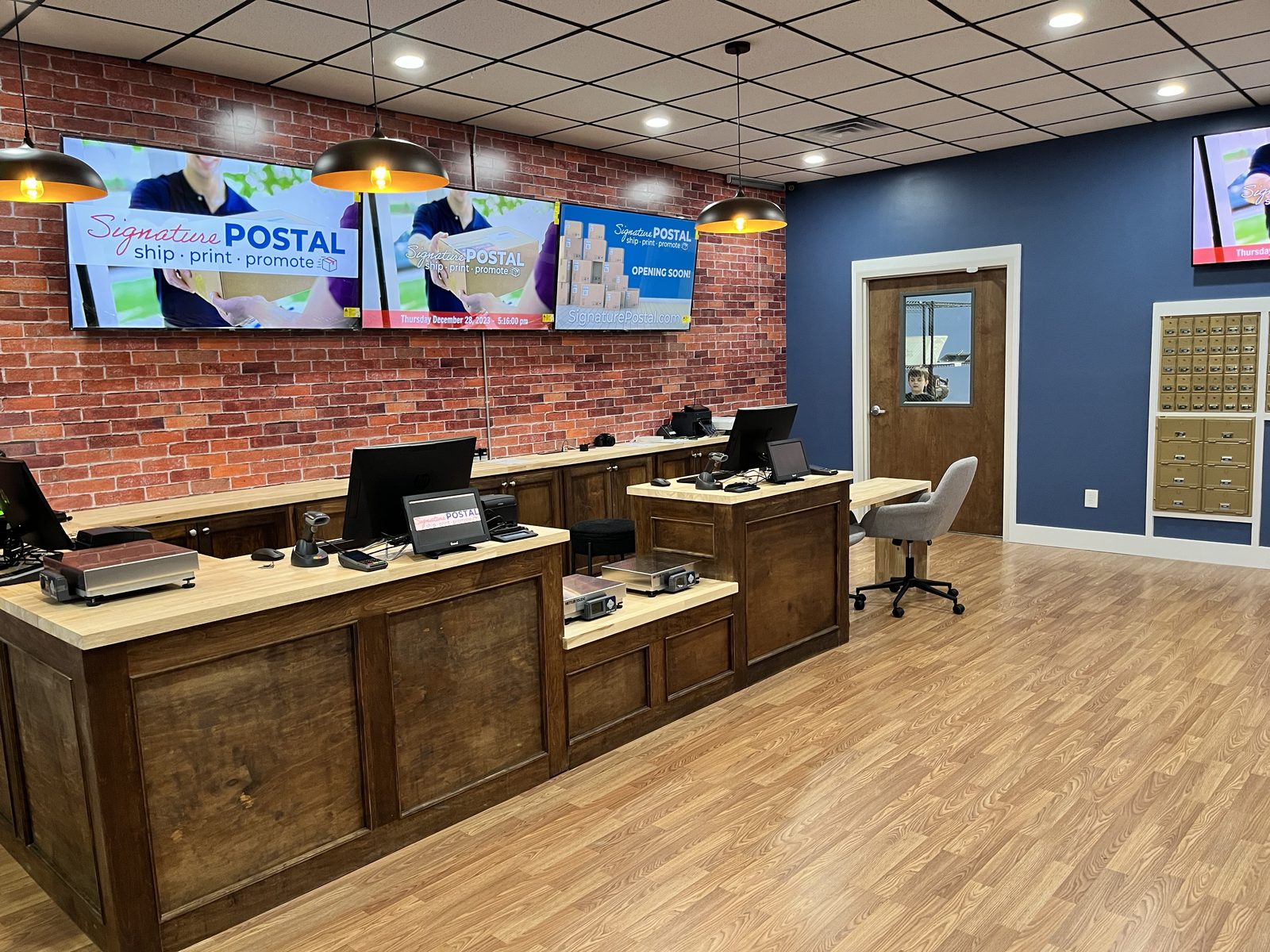 Inside the Signature Postal shop in downtown Fuquay-Varina
